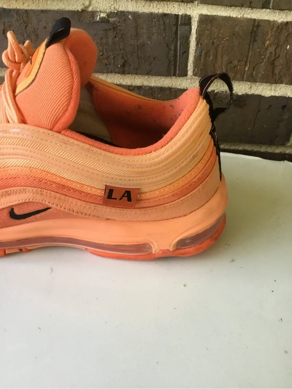Nike Women’s Air Max 97 in Orange and Coral
